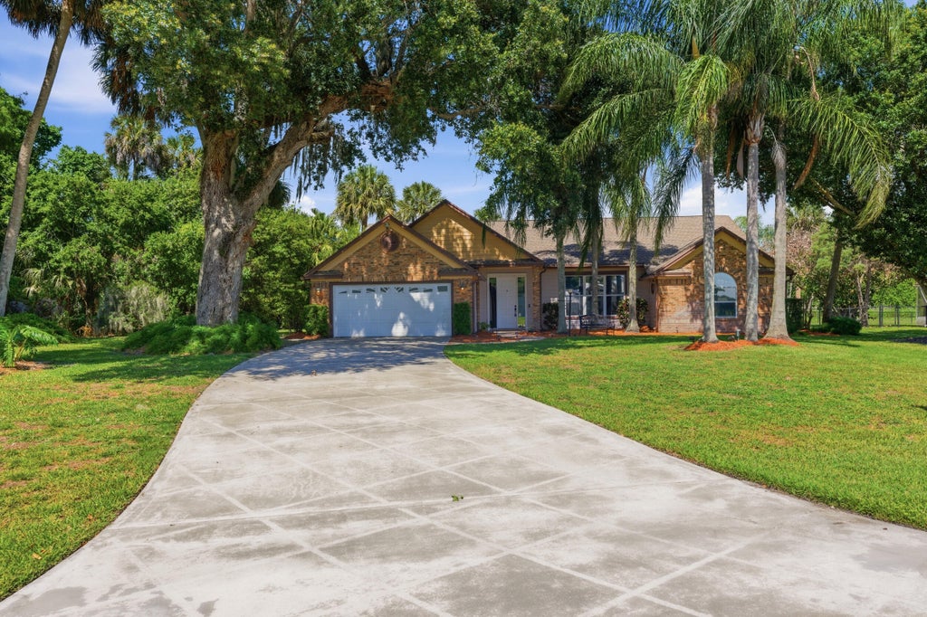 Photo of 1960 SE 9th Avenue, Okeechobee, FL 34974 (MLS # B26026296)