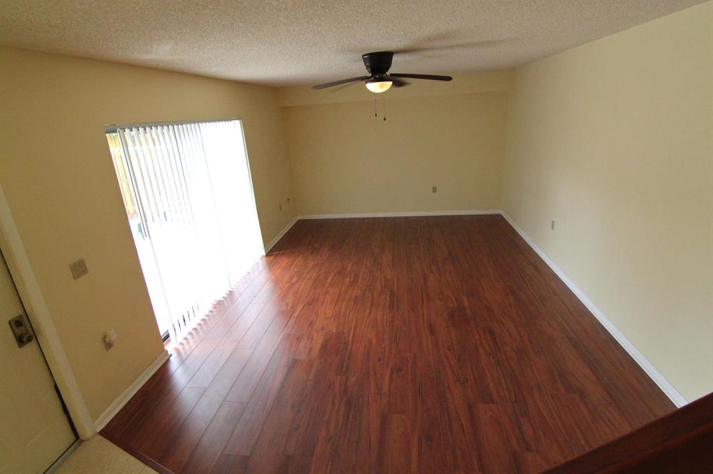 Great location in the Bluffs! Brand new gorgeous wood laminate floors in family room!!! This 2 bedroom and 2.5 bathroom town home is abutted by 2 green space areas. Clean, spacious and ready for a new tenant, you will love living in the bluffs just a short run away from the beach. This lovely home features a large fenced patio, 2 balconies, a newer a/c unit and newer stainless steel refrigerator as well as central vacuum. Enjoy all the amenities offered in the River at the Bluffs including the pool, basketball, tennis and playground! These units never last long on the market! Grab it before it's gone!