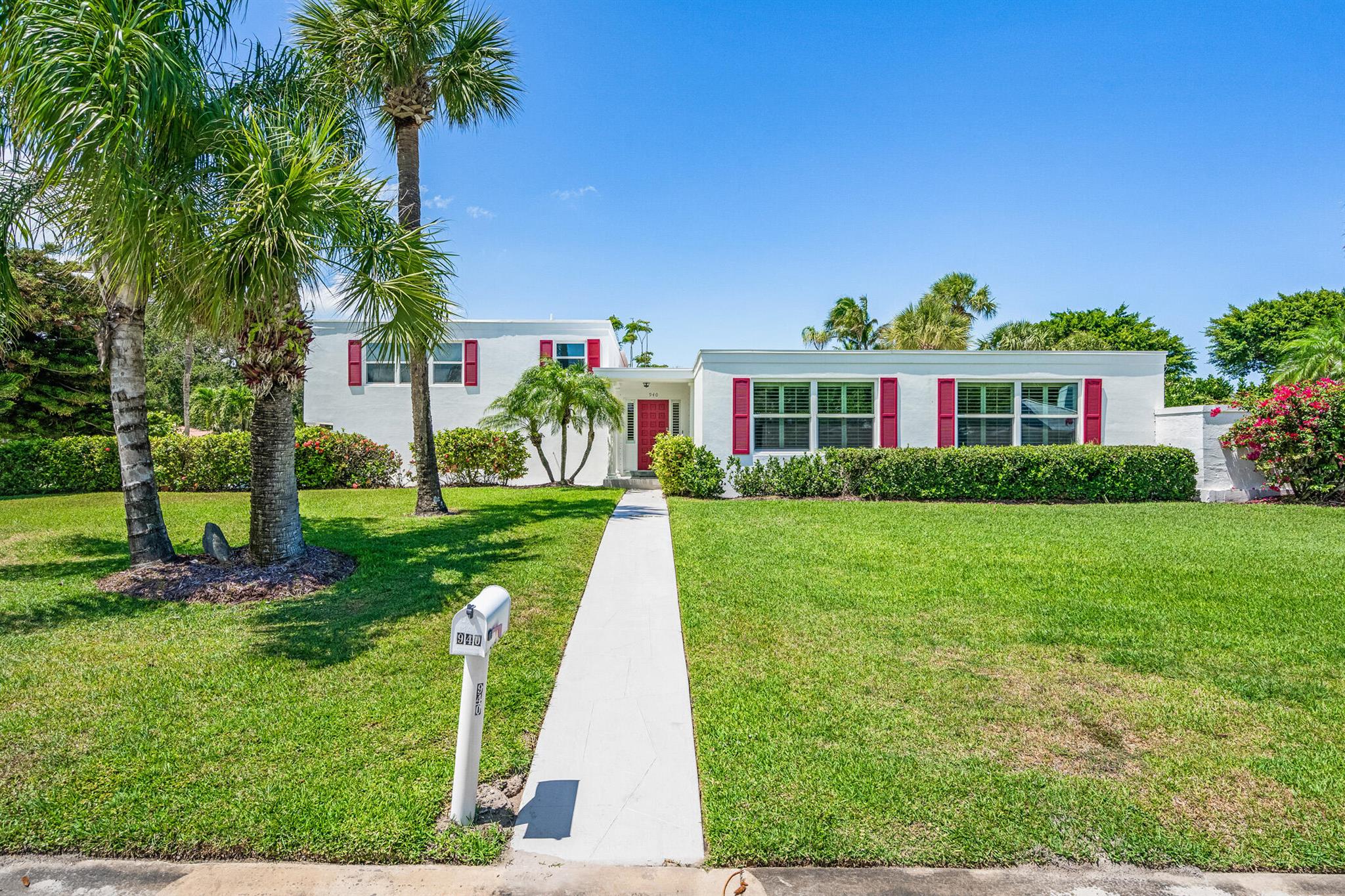 Just a block from the Moorings' private beach, this 4BR/5BA mid-century gem sits on a high corner lot, offering rare privacy and endless potential. A sunlit courtyard with tranquil fountain welcomes you, while the bright interior opens to a serene lap pool--ideal for quiet mornings or entertaining. Includes a 3-car garage with new impact doors and extra storage. Spacious layout and lush surroundings make this the perfect canvas to create your coastal dream home in one of Vero's most desireable beachside communities.