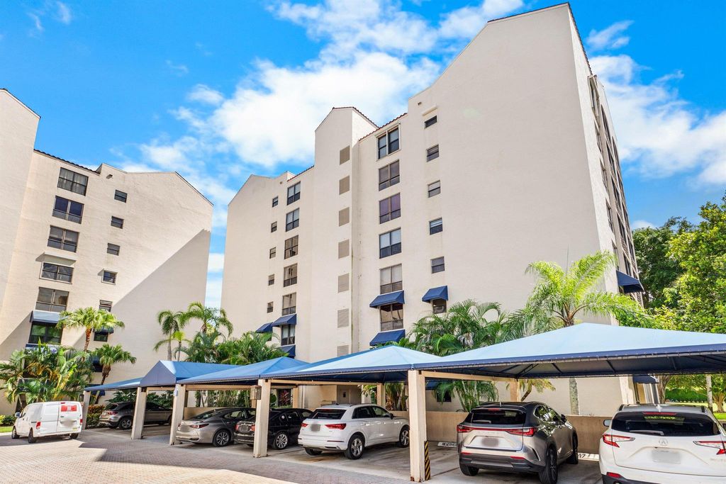 Photo of 7572 Regency Lake Drive #301, Boca Raton, FL 33433 (MLS # R11126940)