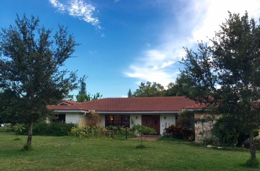 Motivated seller. Large pool home on a oversized lot. 2nd kitchen on patio and fireplace.