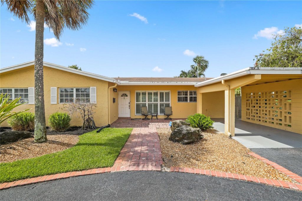Photo of 1040 W Camino Real Real, Boca Raton, FL 33486 (MLS # F10444344)