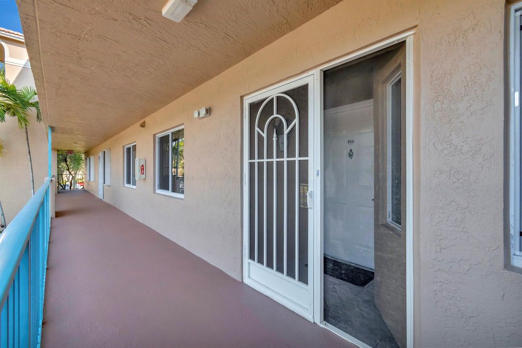 Photo of 12560 Majesty Circle #202, Boynton Beach, FL 33437 (MLS # R10954976)