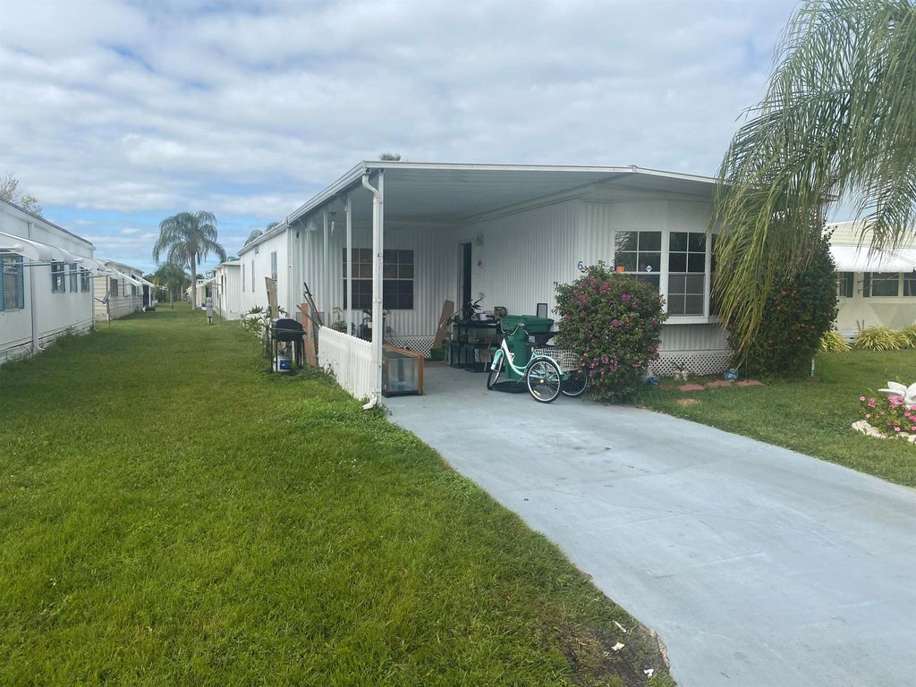 Photo of 6 Nuestra Calle Lane, Port Saint Lucie, FL 34952 (MLS # R10959034)