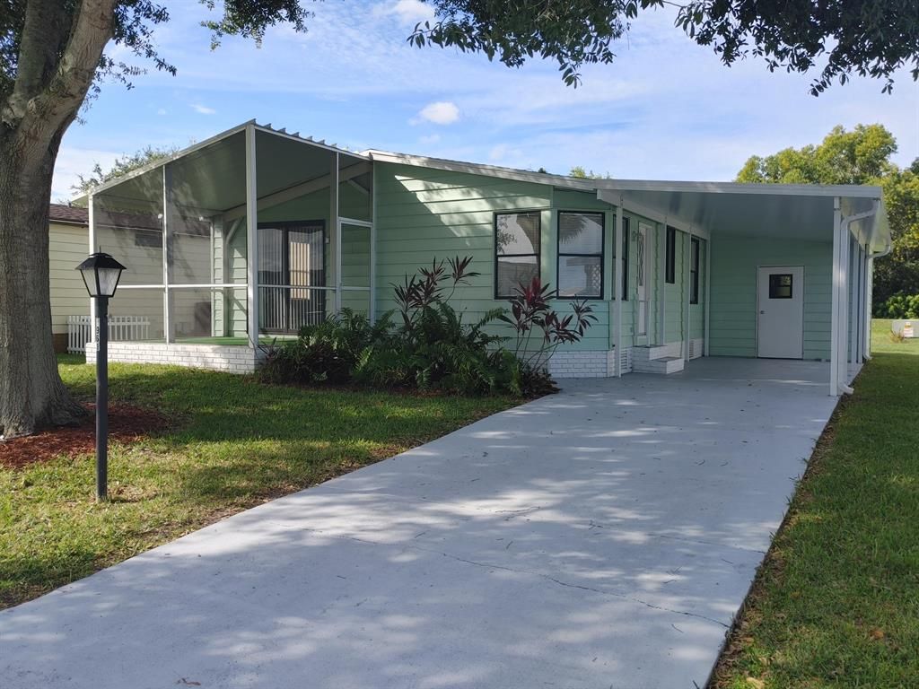 Photo of 2961 Fiddlewood Circle, Port Saint Lucie, FL 34952 (MLS # R10753127)