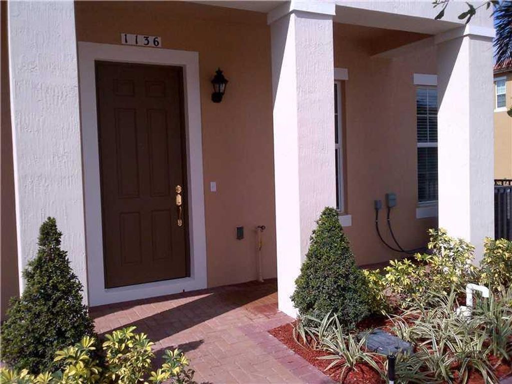 Photo of 1136 SW 147th Avenue #1136, Pembroke Pines, FL 33027 (MLS # F10404341)