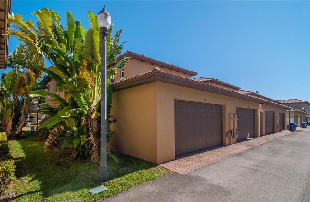 Photo of 1136 SW 147th Avenue #1136, Pembroke Pines, FL 33027 (MLS # F10404341)