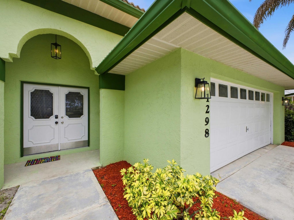 Photo of 1298 SW Cedar Cove, Port Saint Lucie, FL 34986 (MLS # B26039664)