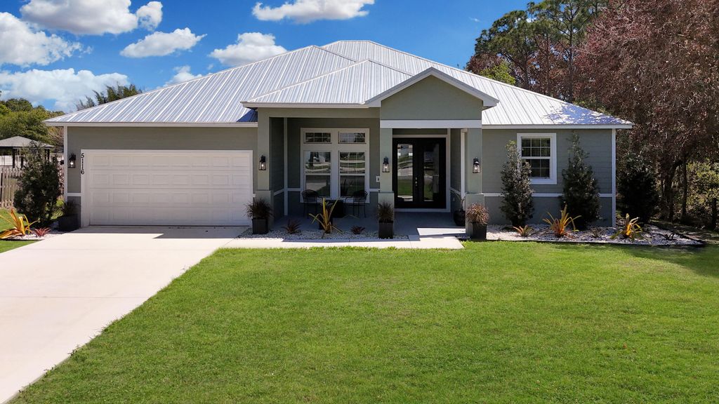 Photo of 5116 Silver Oak Drive, Fort Pierce, FL 34982 (MLS # B26003307)