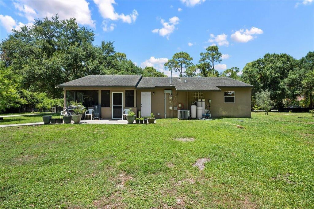 Photo of 13704 58th Court N, The Acreage, FL 33411 (MLS # R11093486)