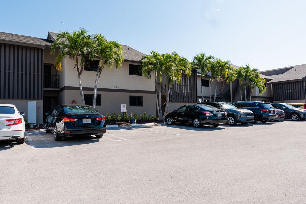 Photo of 1665 Cabot Lane #A4, Wellington, FL 33414 (MLS # B26028173)