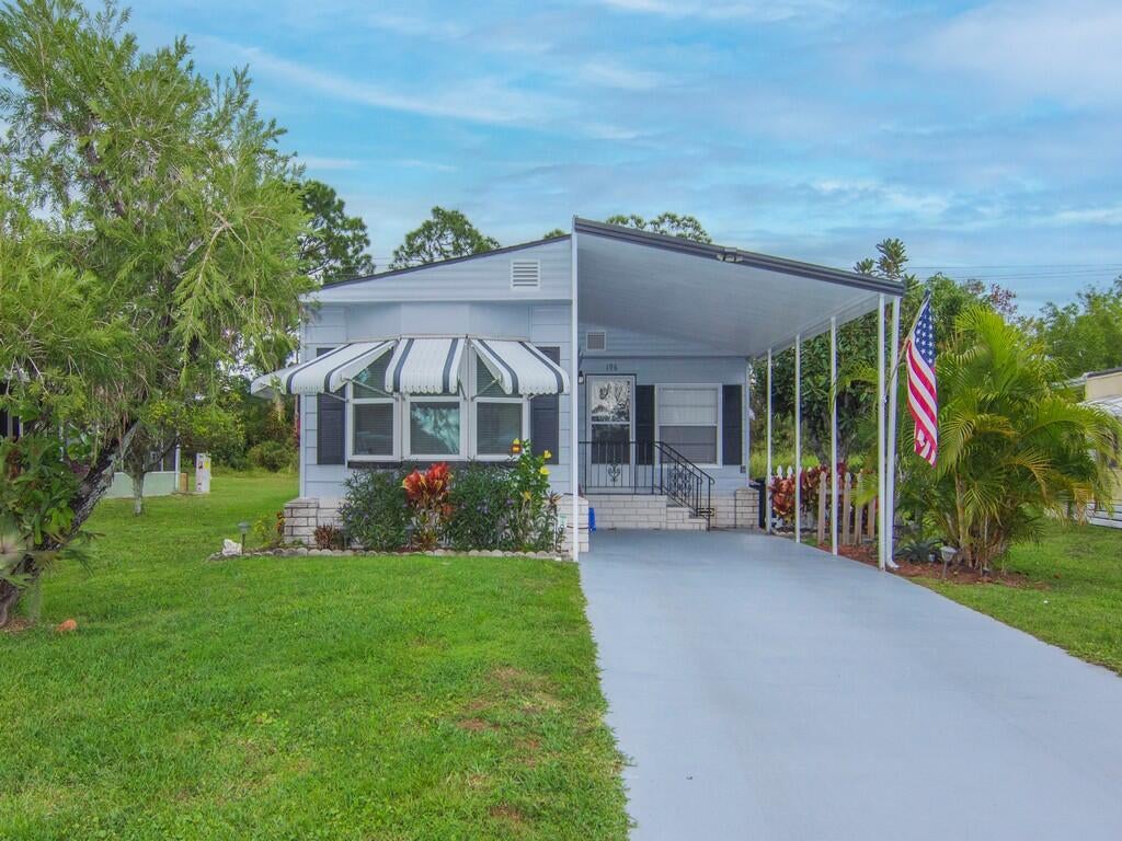 Photo of 61 E Caribbean, Port Saint Lucie, FL 34952 (MLS # B26080985)