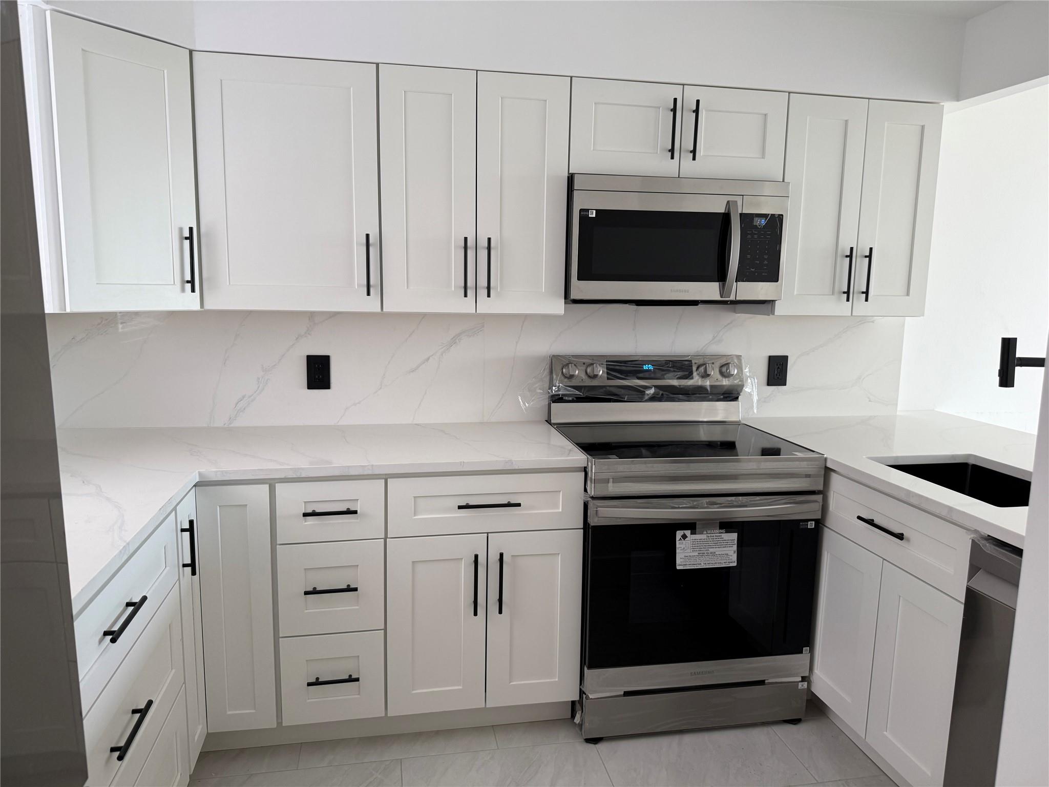Welcome to your beautifully remodeled 4th-floor oasis! This spacious 2-bedroom, 2-bath condo overlooks a peaceful canal and has been tastefully updated . Enjoy cooking in the brand-new kitchen featuring modern cabinetry, sleek countertops, and all-new stainless steel appliances. Both bathrooms have been fully renovated with contemporary finishes, and stylish tile flooring runs throughout the entire unit. The well-maintained community offers great amenities, including sparkling pools. Located just steps from scenic parks, this move-in ready home combines comfort and tranquil water views. Don’t miss out!