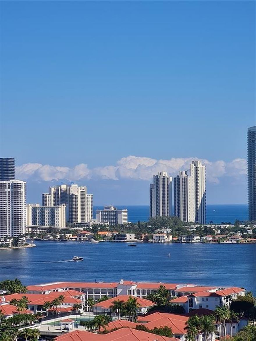 Fantastic views of the Intracoastal, Ocean to the E, Williams Island and  Maule lake from this Penthouse unit. Ample living space with 2100 sq ft under air, 2/2+ office. Washer/dryer inside. Security attendant in the lobby,lots of amenities. Walking distance to shops and synagogues. Just minutes to Aventura Mall and 30 min to Miami. The unit has 2 parking spaces close to the entrance, 1 covered and the other half covered.