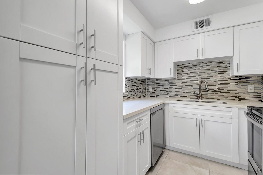 Photo of 21 Brittany A, Delray Beach, FL 33446 (MLS # R11133139)