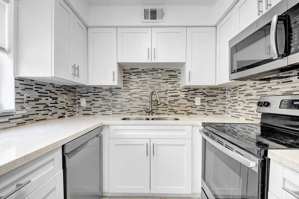 Photo of 21 Brittany A, Delray Beach, FL 33446 (MLS # R11133139)