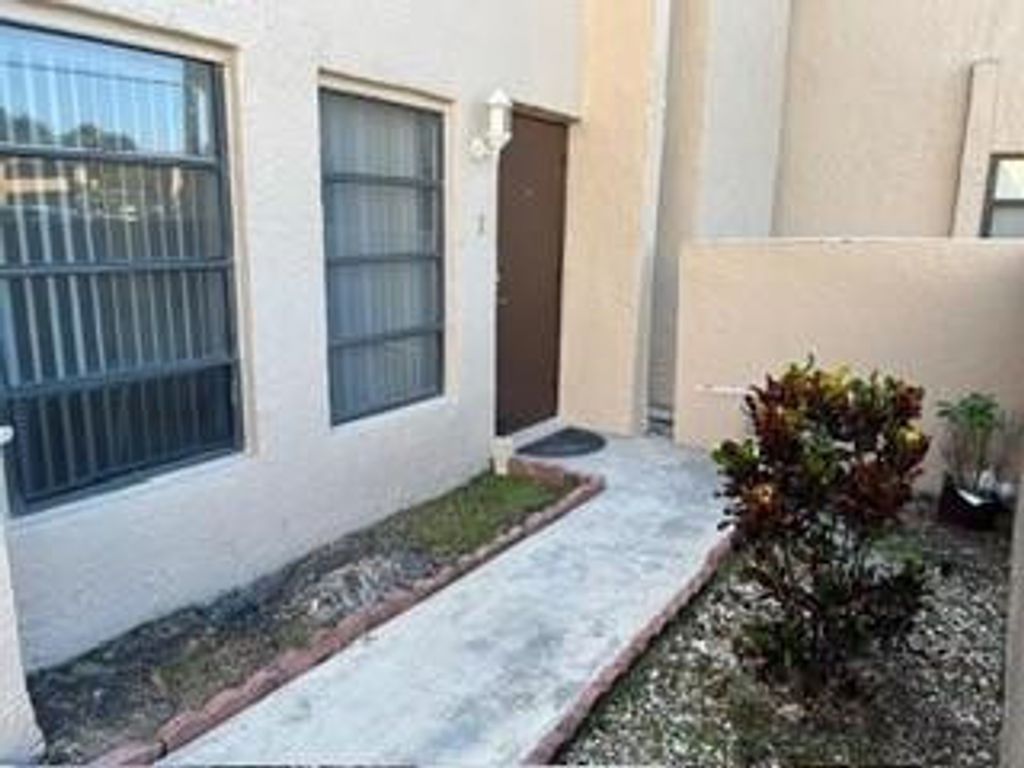 Photo of 3057 Coral Springs Drive #105, Coral Springs, FL 33065 (MLS # F10487204)