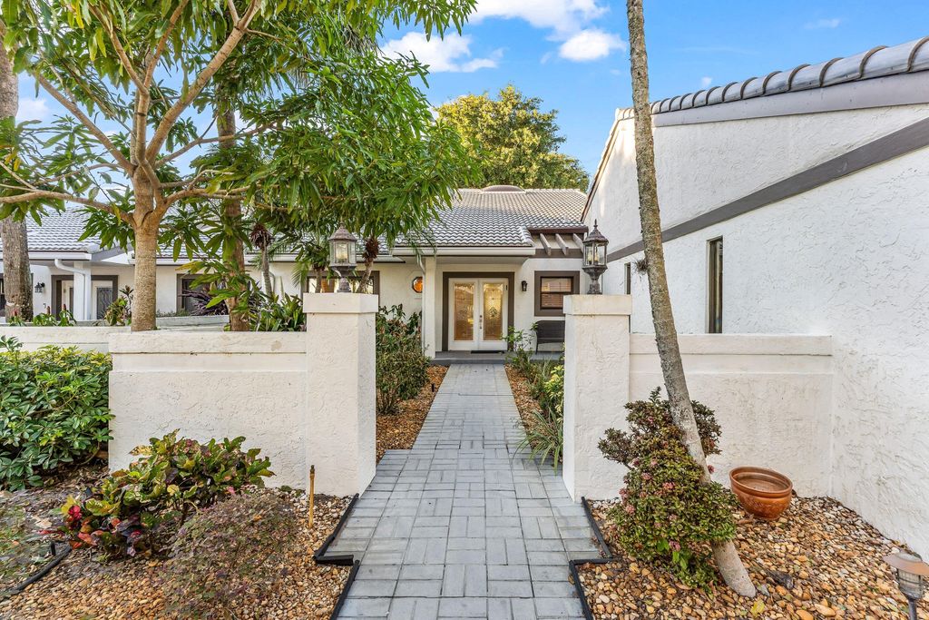 Photo of 37 Clubhouse Lane, Boynton Beach, FL 33436 (MLS # R11160950)