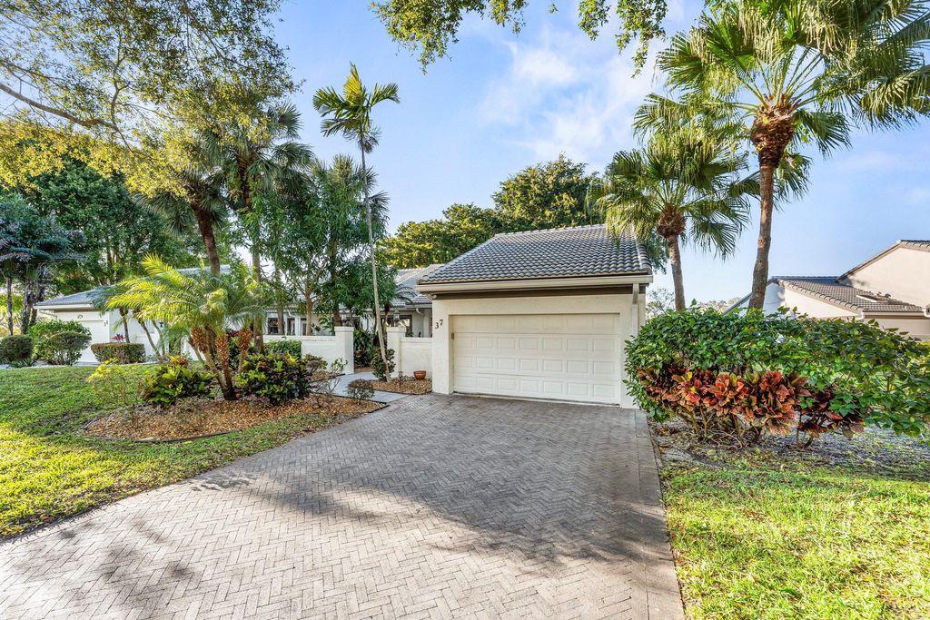 Photo of 37 Clubhouse Lane, Boynton Beach, FL 33436 (MLS # R11160950)