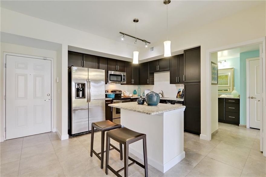 Come make this home sweet home yours, centrally located in downtown Doral surrounded by outstanding shopping, restaurants and entertainment. Enjoy exceptional community amenities including a resort-style swimming pool, two-story fitness center, resident lounge with billiards, business center, stunning dual tier clubhouse with party room, and lakeside grilling area. Unit features modern kitchen with stainless steel appliances and elegant granite countertops; custom wood cabinetry; tile backsplashes; pantries; full-size washers and dryers; designer tile flooring in living areas, kitchens and baths; soaking tubs in master baths; large walk-In closets; programmable thermostats; spacious private patios and balconies; and much more.