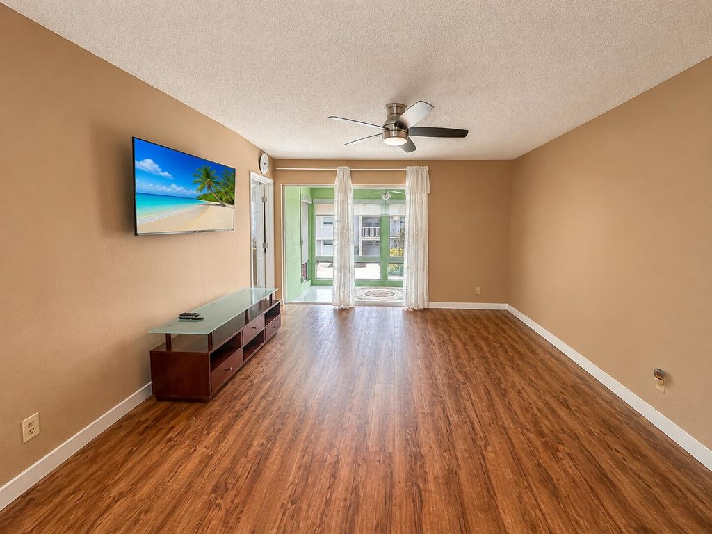 Photo of 18 Colonial Club Drive #200, Boynton Beach, FL 33435 (MLS # B26035034)