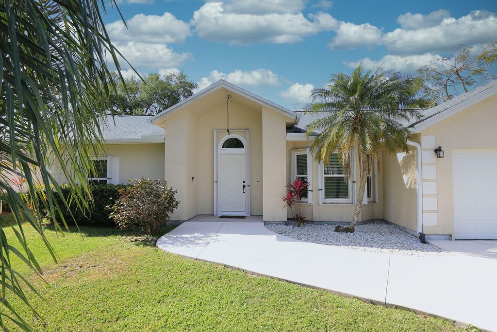 Photo of 1686 SW Fortune Road, Port Saint Lucie, FL 34953 (MLS # R10968843)