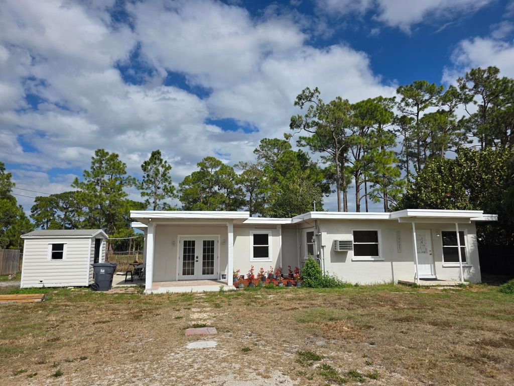 Photo of 15427 San Diego Drive, Loxahatchee Groves, FL 33470 (MLS # R11169126)