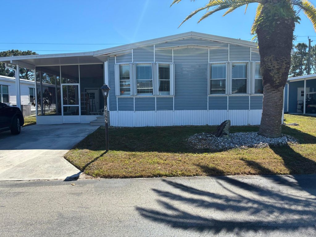 Photo of 7162 SE Sweetwood Terrace, Stuart, FL 34997 (MLS # R11160193)