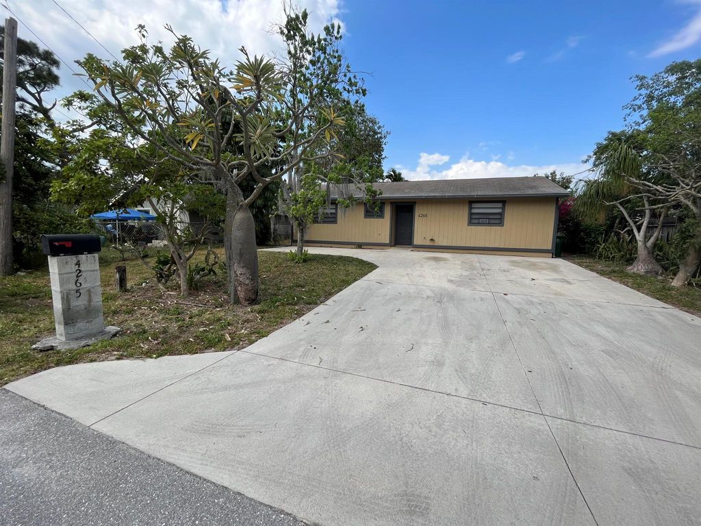 Photo of 4265 Narcissus Avenue, Palm Springs, FL 33461 (MLS # R10896642)