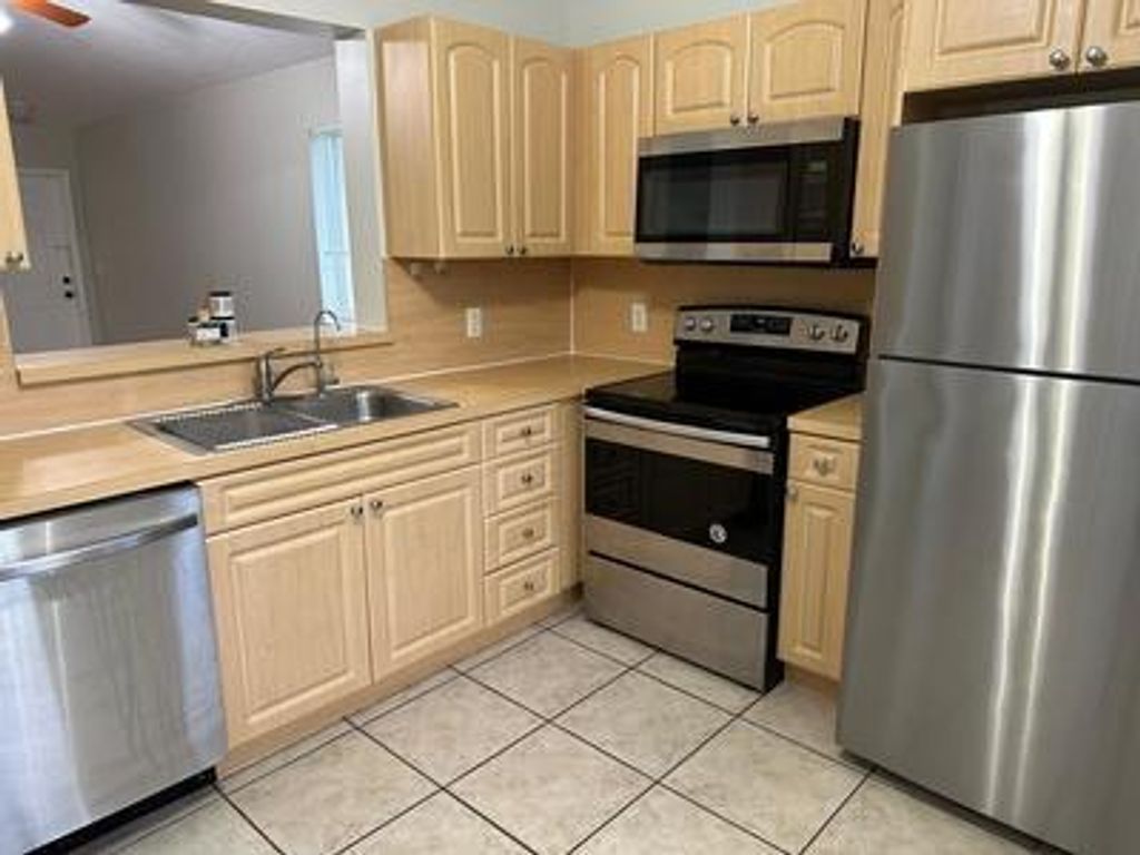 Photo of 7830 NW 6th Street #201, Pembroke Pines, FL 33024 (MLS # B26018050)