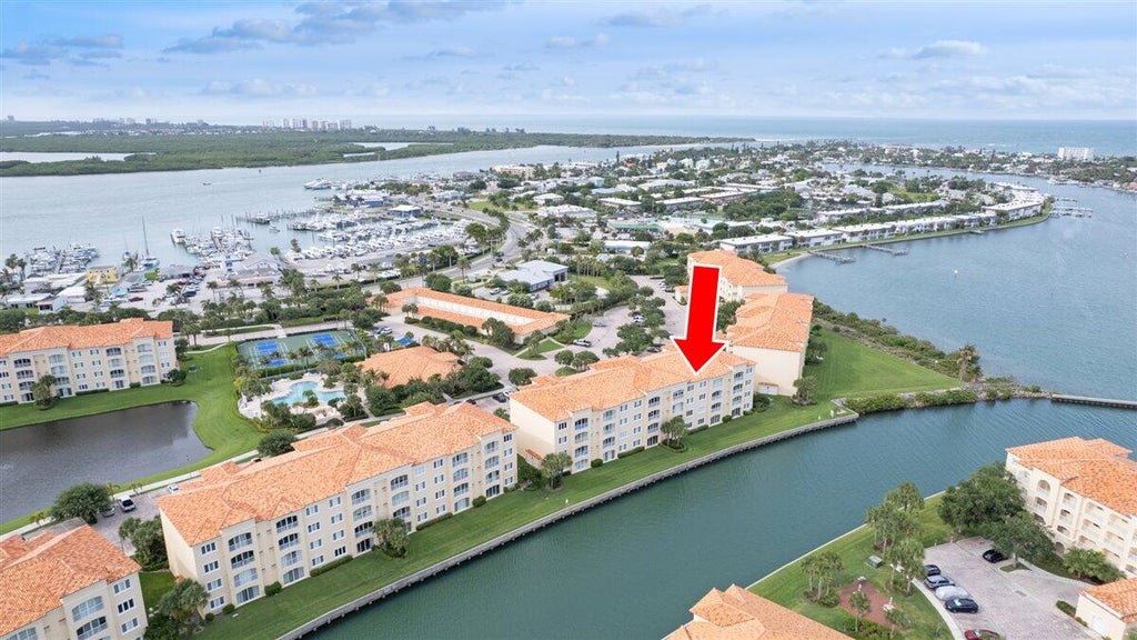 Photo of 5 HARBOUR ISLE Drive E #103 with Garage, Fort Pierce, FL 34949 (MLS # B26059009)