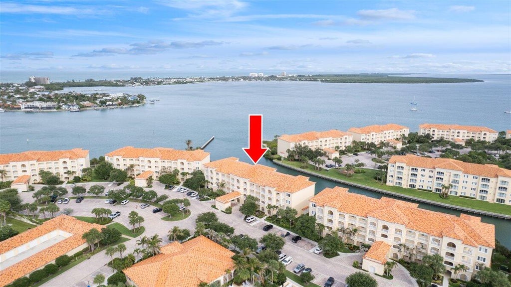 Photo of 5 HARBOUR ISLE Drive E #103 with Garage, Fort Pierce, FL 34949 (MLS # B26059009)