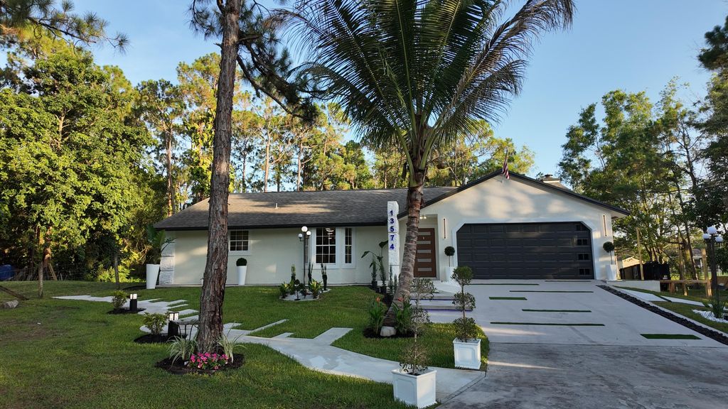 Photo of 13574 59th Court N, The Acreage, FL 33411 (MLS # B26049176)