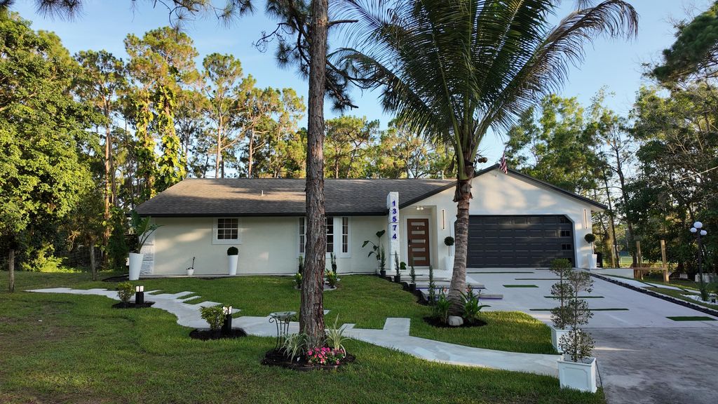 Photo of 13574 59th Court N, The Acreage, FL 33411 (MLS # B26049176)