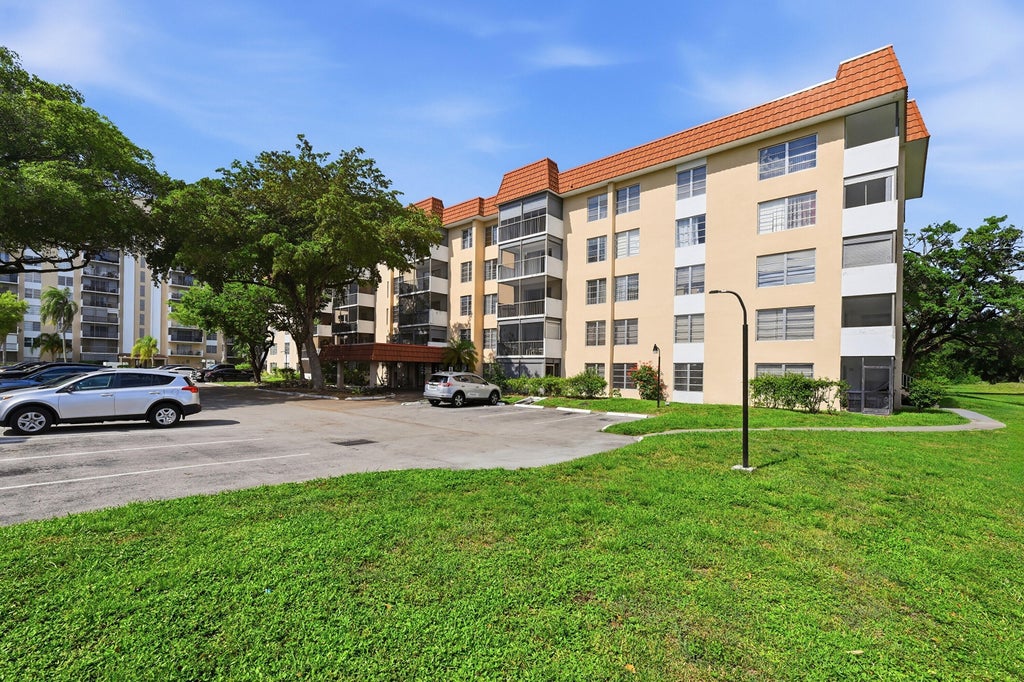 Photo of 4158 Inverrary Drive #511, Lauderhill, FL 33319 (MLS # B26046480)