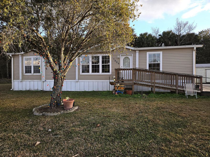 RIVER RUN RESORT - Newer 2020 DWMH - 3bdrm 2 ba, w/1,620 sf under air.  Open concept with spacious living room.  Kitchen overlooks living room & dining room equipped with large island with bkfst bar area and wine rack.  Lots of counter space and an oversized, walk-in pantry that is every chef's dream!  Each bdrm has walk-in closet.  Primary bath suite features double-sink vanity, roman tub, shower and tons of cabinets for storage.  Wood laminate throughout,  Ceiling fans.  Indoor laundry room.  Backyard is private and offers loads of  space for outdoor family activities & gatherings.  11' x 24' shed offers storage and a temporary wall providing space for man-cave or she-shed.  A 12' x 24' covered open storage area provides that additional storage space.  Measure for accuracy