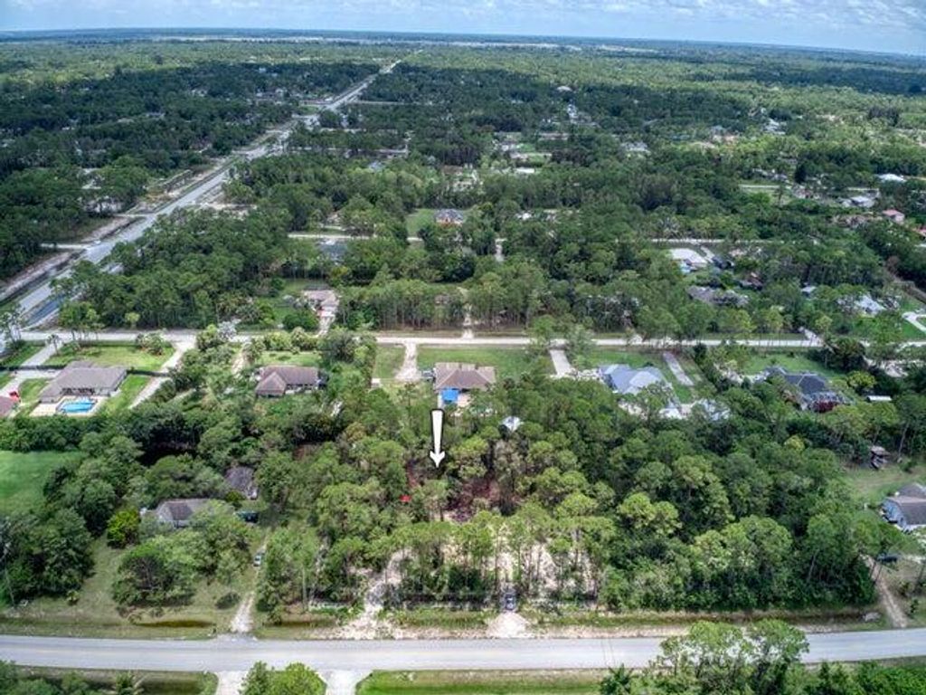 Photo of 16104 Valencia Boulevard, The Acreage, FL 33470 (MLS # R10983311)