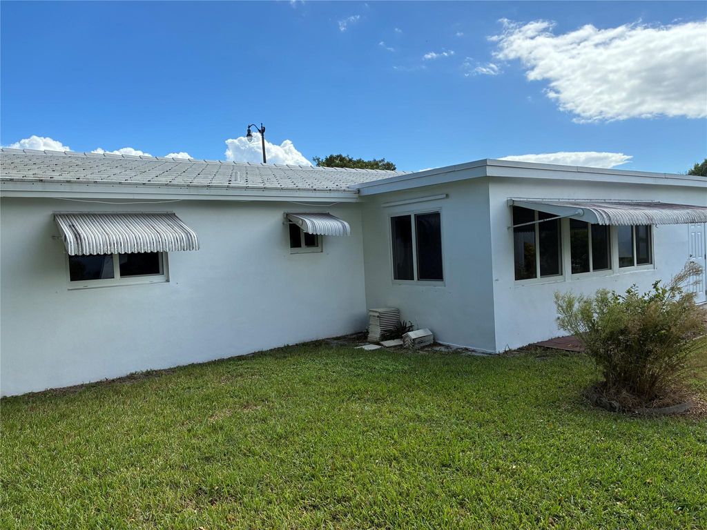 Photo of 3021 E Golf Blvd, Pompano Beach, FL 33064 (MLS # F10531128)
