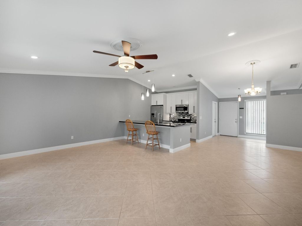 Photo of 16 SE Winchmore Lane, Boynton Beach, FL 33426 (MLS # R10948031)