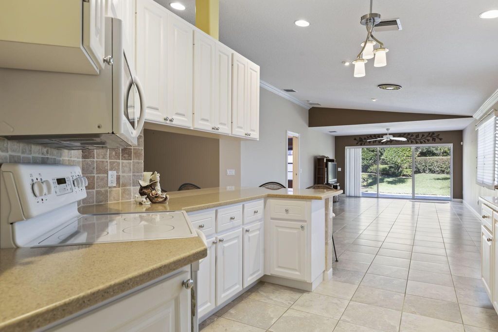 Photo of 10731 SW Hartwick Drive, Port Saint Lucie, FL 34987 (MLS # R10928340)