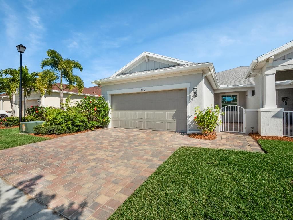 Photo of 12839 SW Gingerline Drive, Port Saint Lucie, FL 34987 (MLS # R10953770)