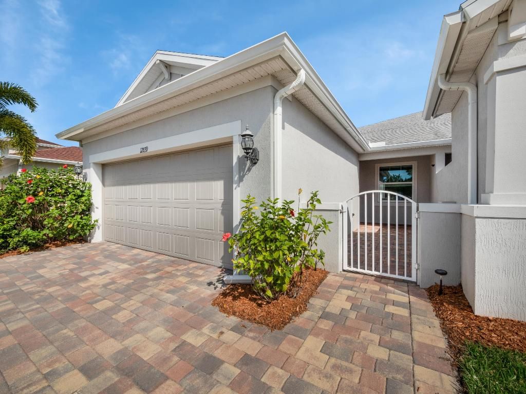 Photo of 12839 SW Gingerline Drive, Port Saint Lucie, FL 34987 (MLS # R10953770)