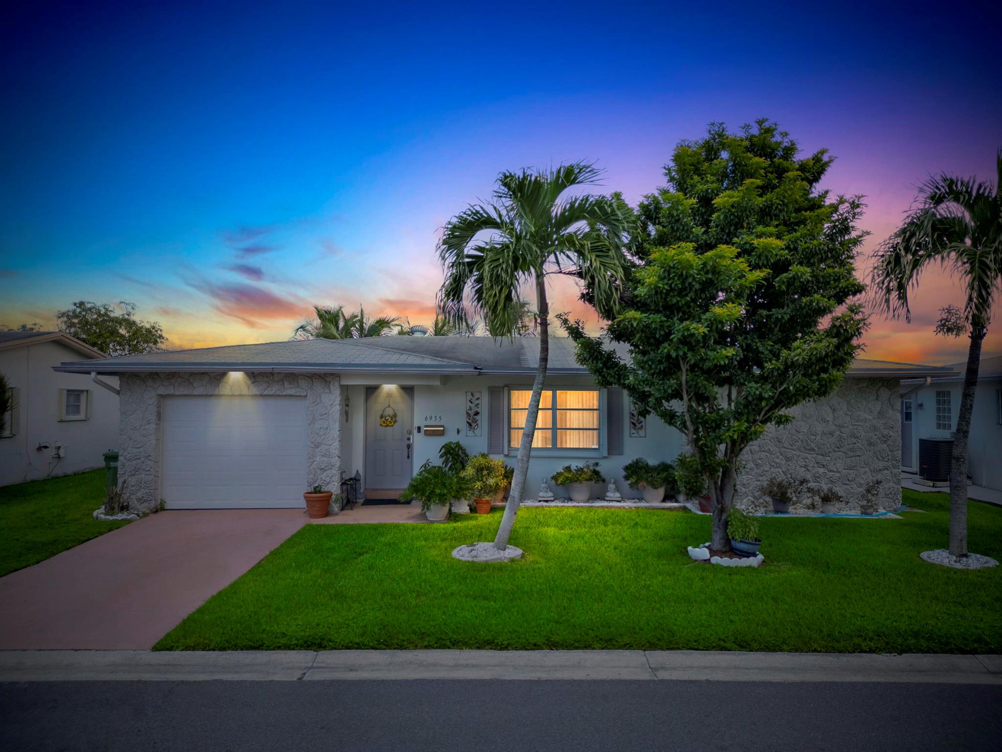 Waterfront Living - Very Low HOA, Bring Your Boat! 🌴🚤Must-See 2 Bedroom, 2 Bath, Fully Upgraded Waterfront Home featuring a Custom Kitchen with Abundant Cabinet Space and a Large Island.Enjoy Peace of Mind with a Brand-New AC (2025), Water Heater(2024) Accordion Hurricane Shutters throughout, New Appliances !This Waterfront Paradise combines Modern Upgrades with the Perfect Lifestyle Setting - Relax on the Water, Entertain on the Large Patio or Take your Boat Out Anytime !