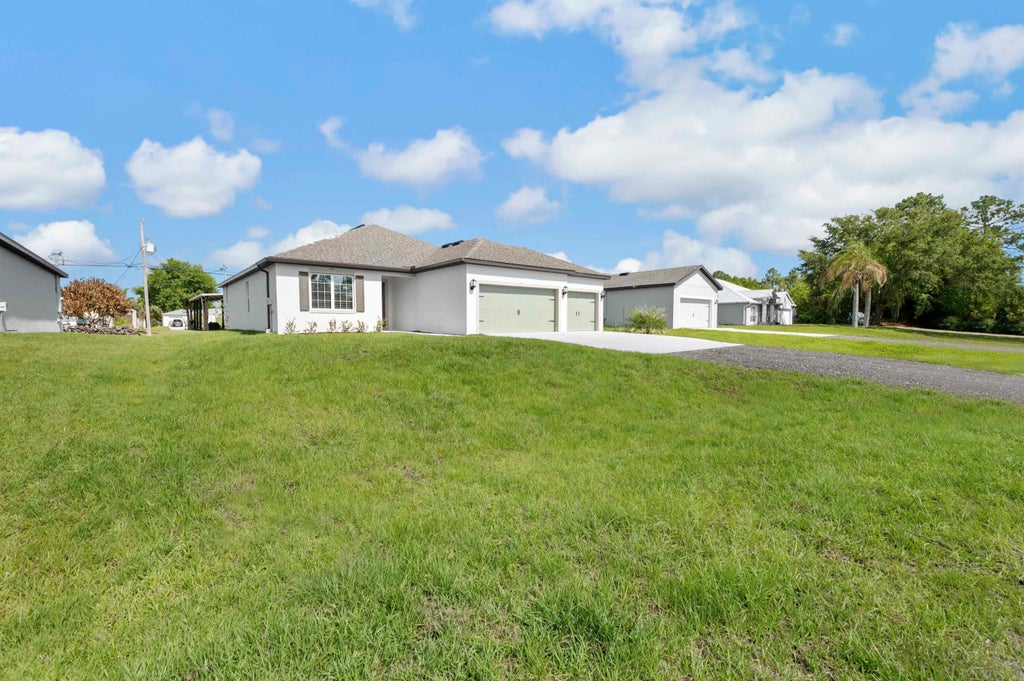 Photo of 8225 95th Avenue, Vero Beach, FL 32967 (MLS # B26042347)