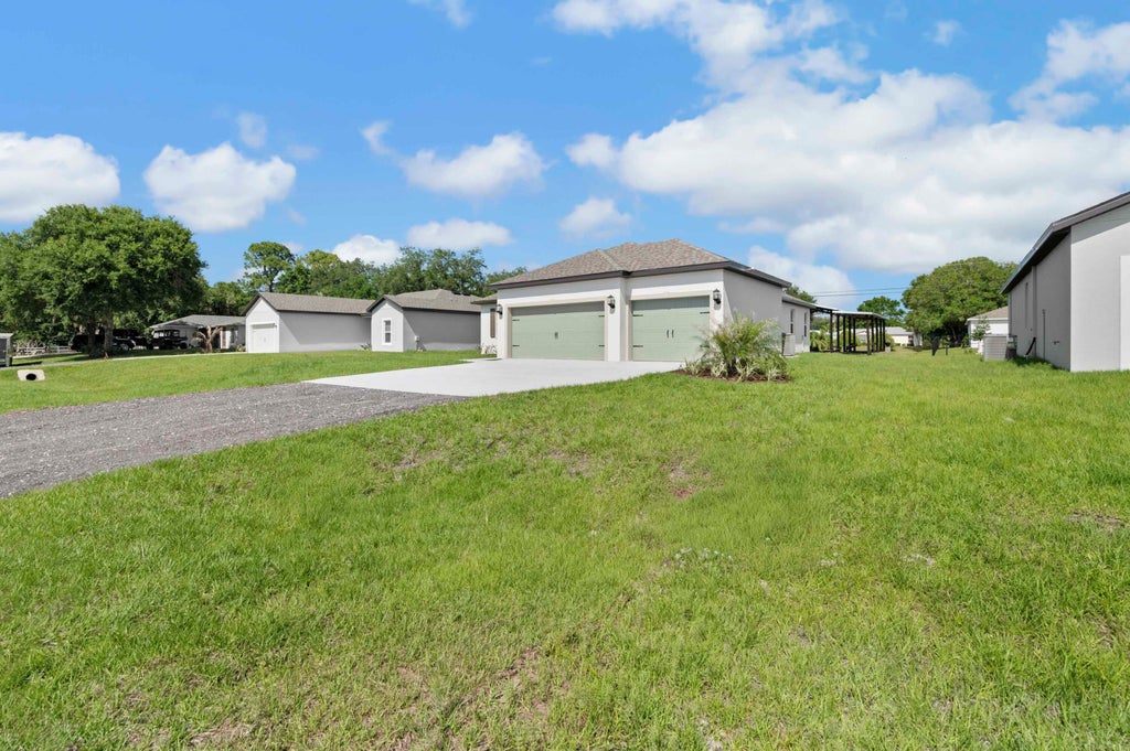 Photo of 8225 95th Avenue, Vero Beach, FL 32967 (MLS # B26042347)
