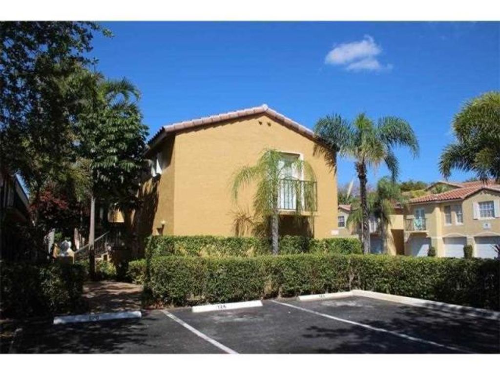 Photo of 1140 Lake Shore Drive #205, Lake Park, FL 33403 (MLS # R10777378)