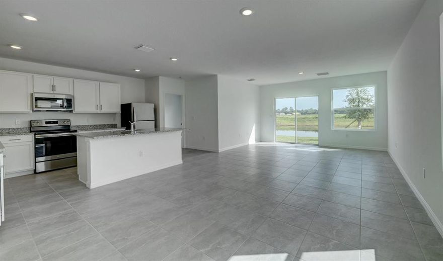 Available Now – ONE STORY 4 BED, 3 BATH, 2 CAR GARAGE – Amazing opportunity with a zero down payment option and low monthly payments through the USDA loan program, restrictions apply. This home features an Extra Suite Plus with full living area, ideal for multi-generational living. Kitchen with an oversized island and cozy dining area for meals. A great room with access to the patio to enjoy the outdoors. Private owner's suite with owner's bath and walk-in closet. Direct access to laundry room from 2-car garage. 17x17 ceramic tile in main living area, and owners' bath. 12x12 ceramic tile in hall bath and extra suite plus bath. Carpeting in all bedrooms. Clubhouse with fitness center, resort-style pool, picnic area, playground, volleyball, pickleball and a Tennis court