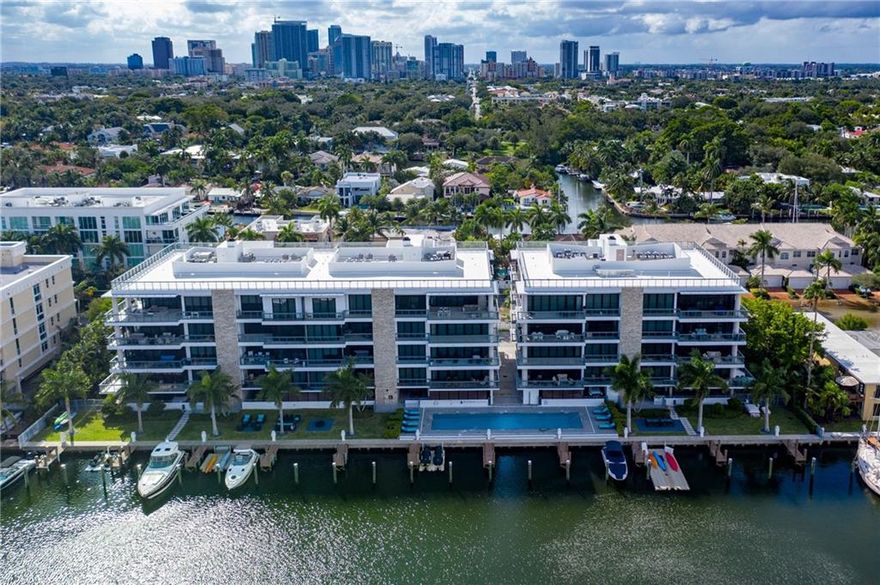 Enjoy secluded resort-style living on Las Olas at Aqua Vista. This stunning, spacious 2-bedroom (plus den), 2-bathroom condo offers gorgeous water views and refined luxury living just steps from downtown Fort Lauderdale. Enter the home from your private elevator and step into an open-concept, high-ceilinged space, complete with lavish Italian finishes, a Wolfe gas range and other high-end appliances. The living area and master bedroom both include a large balcony that overlooks your deeded dock — with room for a 53’ boat — and water views. Other resort amenities include a saltwater pool, two parking spaces with electric plug-ins, workout room and a canal-side entertaining space. Enjoy direct ocean access with no fixed bridges. Come live this luxurious lifestyle.