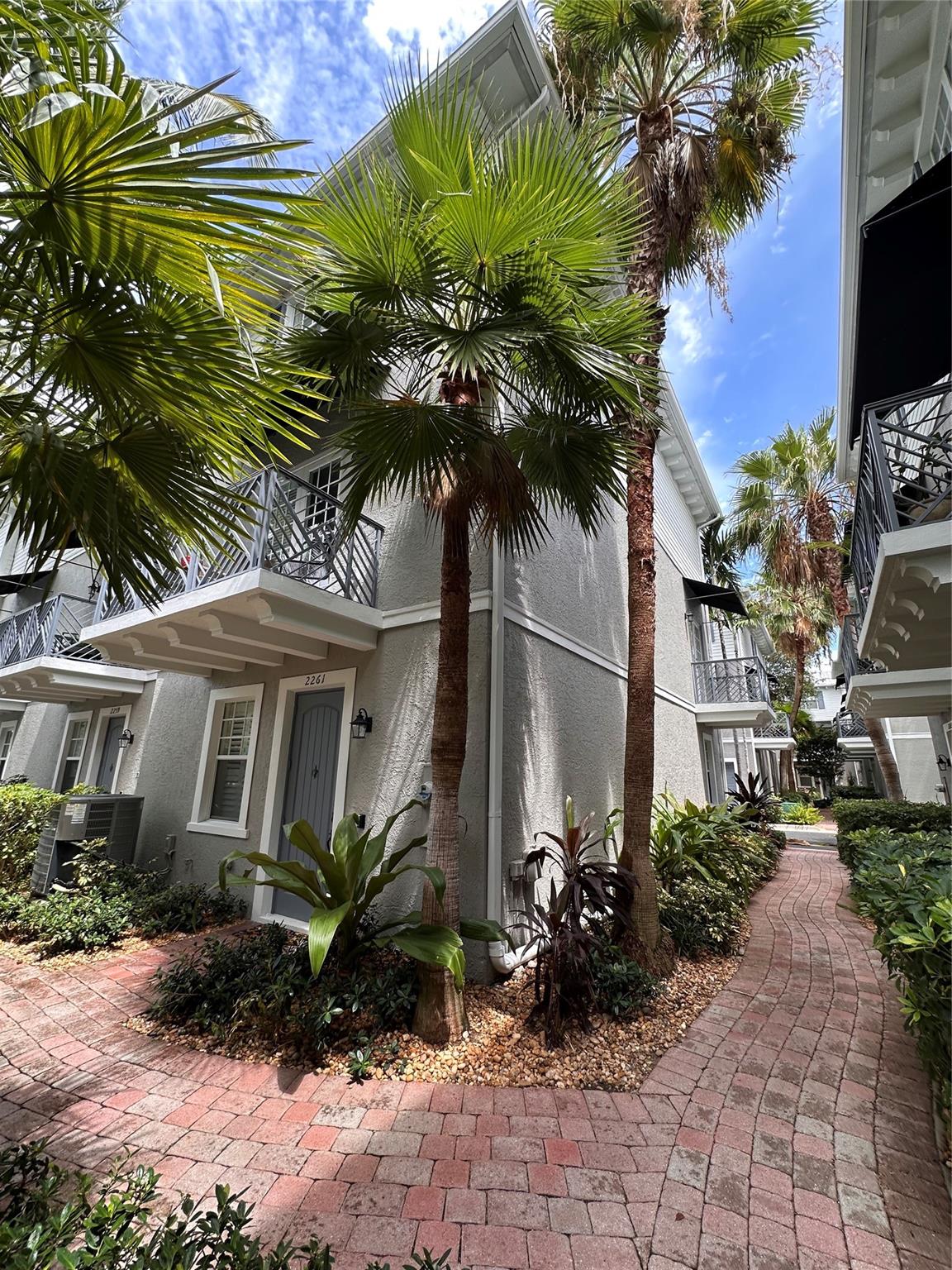 One of the finest addresses in Wilton Manors, Belle Isle is an exquisitely designed, maintained, and located townhome community directly on Wilton Drive across from restaurants, shopping and night life. This 4 bedroom 3.5 bath meticulous unit is one of the few coveted corner units and is located in the interior of the complex a few doors away from the pool with beautiful garden and pool views. As a corner, this lovely three story townhouse is flooded with light from all directions. The balcony is charming and private; the townhouse is expansive with a two car garage and boasts of the finest interior finishes including luxury baths, built in closets and plantation shutters. Come home to Belle Isle and you will live in the best Wilton Manors has to offer.