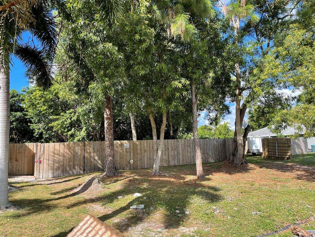 Photo of 3032 SW Ann Arbor Road, Port Saint Lucie, FL 34953 (MLS # R10757924)